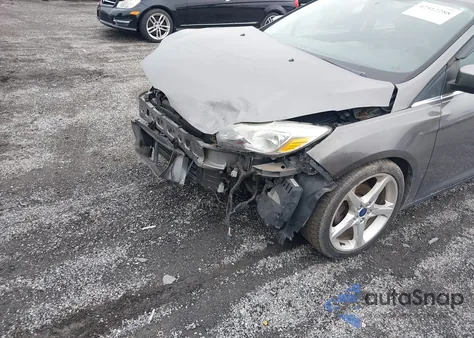 2013 Ford Focus Titanium из США, поврежденный, VIN 1FADP3J24DL317997